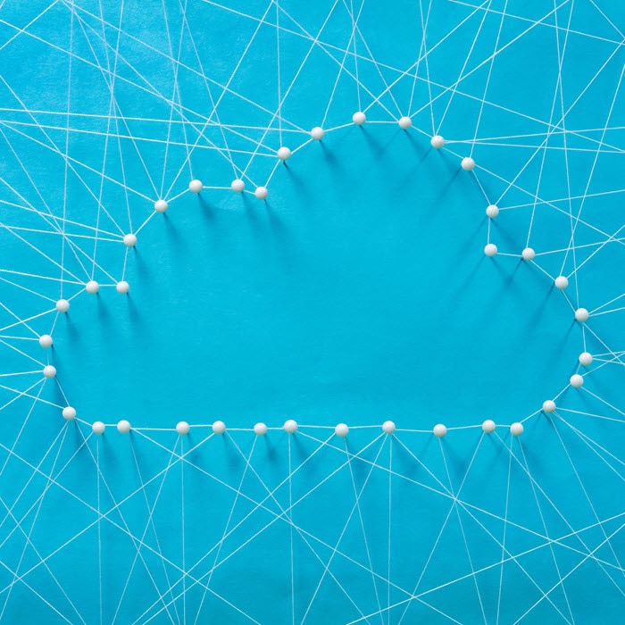 blue cloud shape from thumb tacks