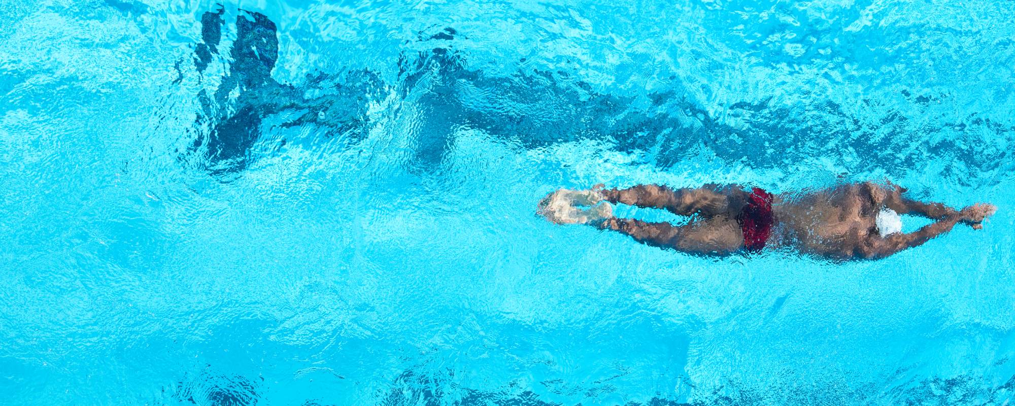 Jamal Hill,, U.S. Paralympian swimming in pool